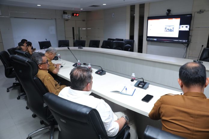 Rapat Koordinasi melalui Zoom Meeting terkait Update Investasi dan Operasional Kawasan Industri Proyek Strategis Nasional (PSN) Kawasan Industri Tanjung Sauh Batam, bersama Kementerian Koordinator Bidang Perekonomian, pada Senin (11/11/2024). (Diskominfo kota Batam)